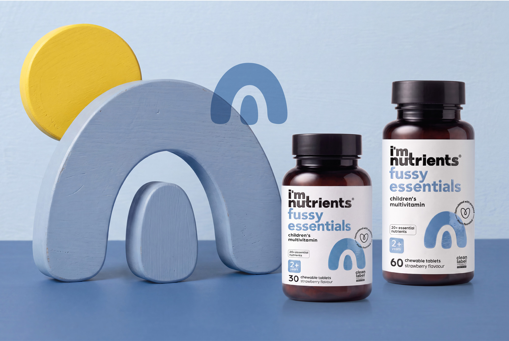 I'm Nutrients Fussy Essentials multivitamin bottles with blue rainbow forms